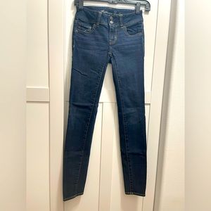 American Eagle Super Stretchy Skinny Jeans (Dark Blue Wash) Size: 00